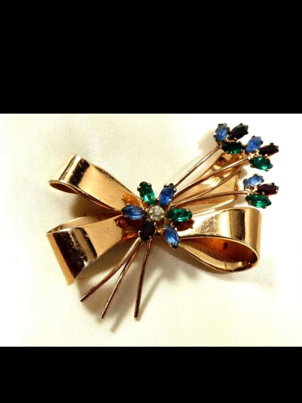 Coro Gold-Tone Bow Brooch with Blue, Green and Clear Stones